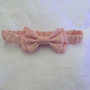 Claire’s pink bow headband